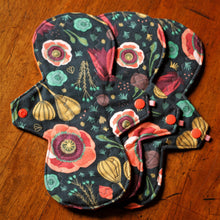 Load image into Gallery viewer, The dark blooms is a black background pad with poppy seedheads and flowerheads